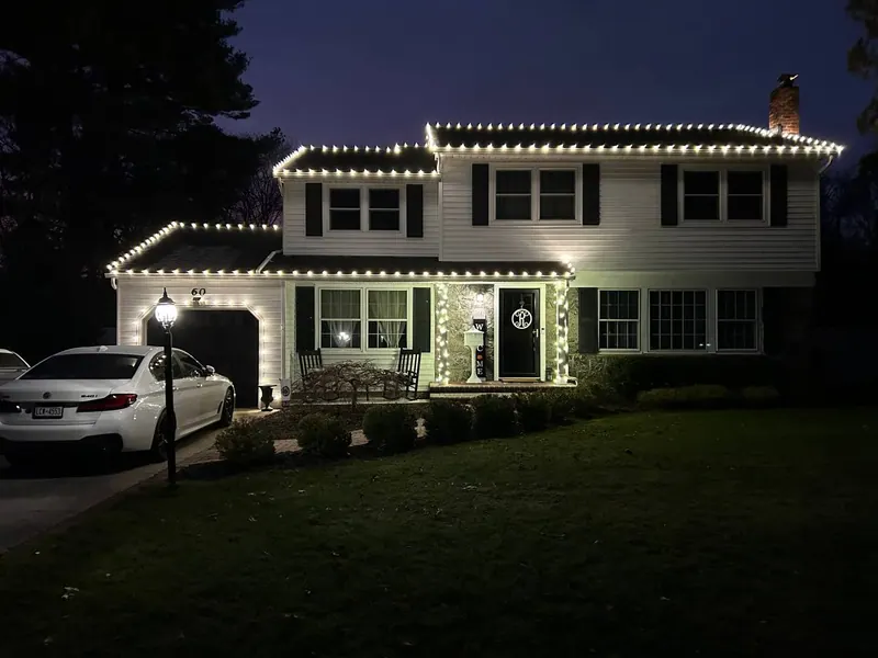 Colonial home in warm white bulbs